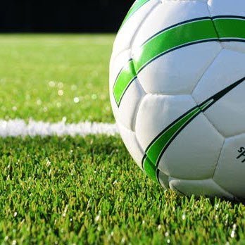 soccer ball and synthetic pitch