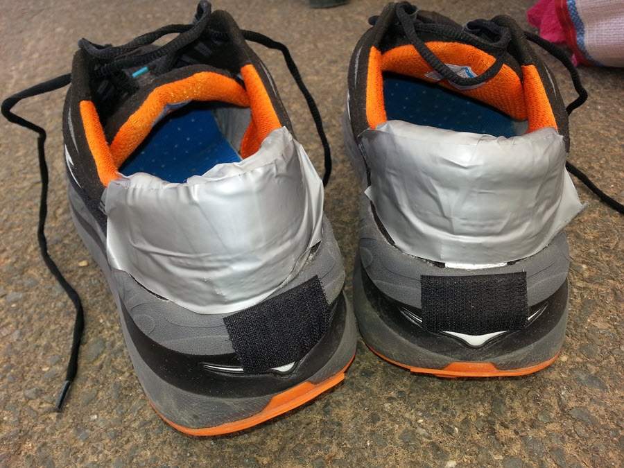 Duct tape to fight holes in the back of running shoes